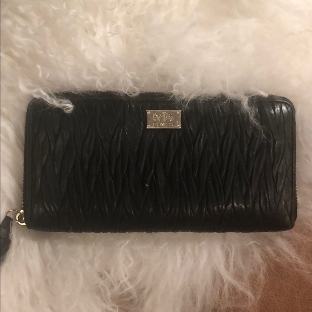 Women’s black leather Coach wallet